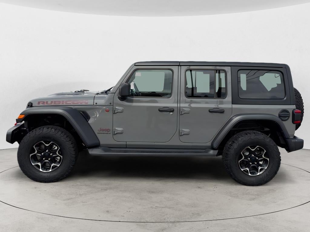 2023 Jeep Wrangler Rubicon in Sting-Gray Clear Coat — front three-quarter view