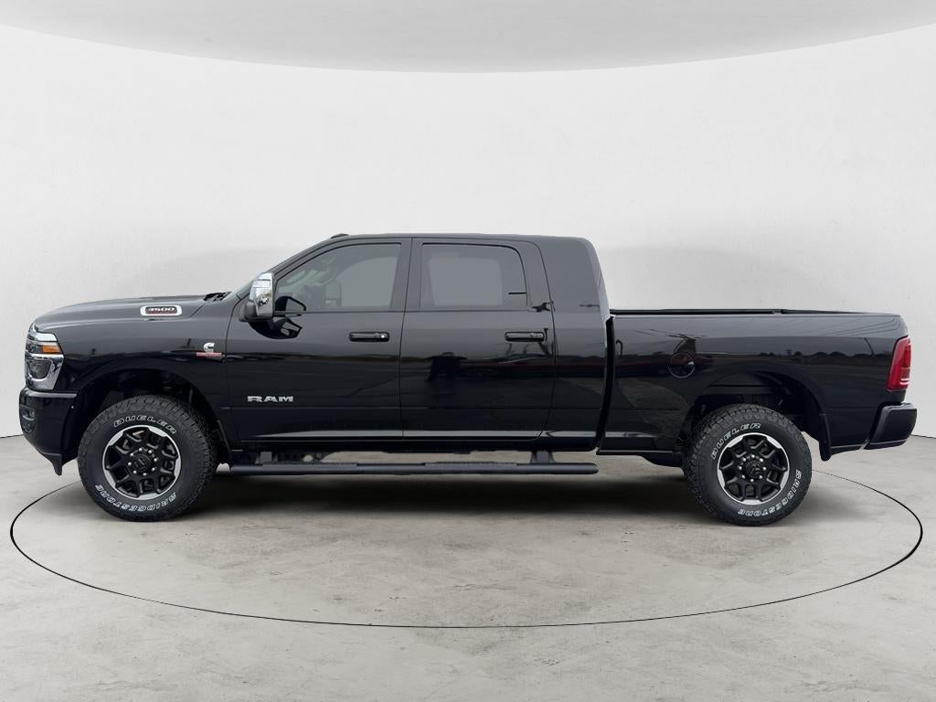 2025 RAM 3500 Laramie Mega Cab 4x4 6'4" Box in Black — front three-quarter view