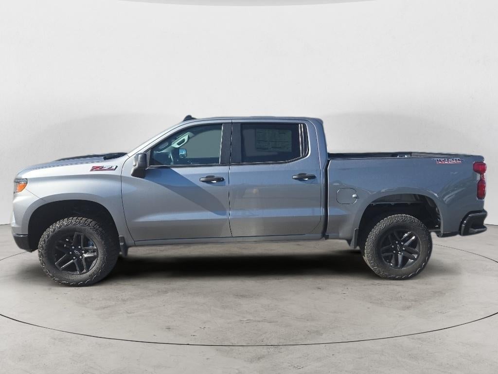 2026 Chevrolet Silverado 1500 Custom Trail Boss in Sterling Gray Metallic — front three-quarter view