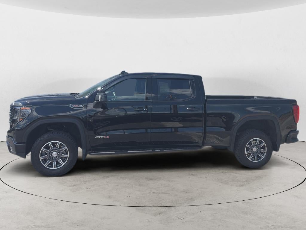 2024 GMC Sierra 1500 AT4 in Onyx Black — front three-quarter view